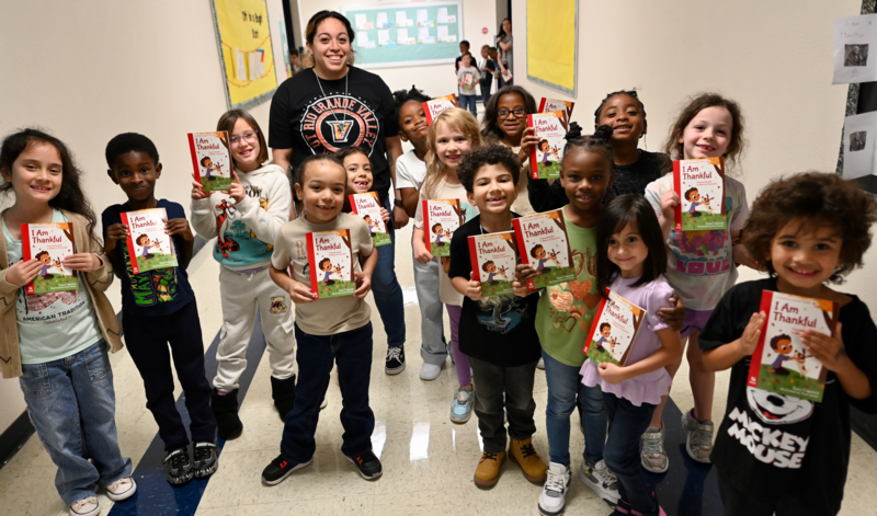 Book donation to Clarke ES