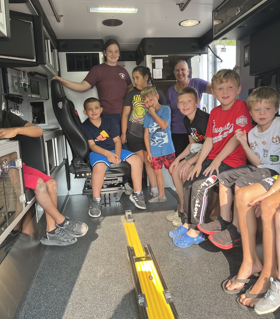 students in fire and rescue truck