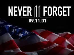black baground with flag and white lettering stating Never Forget 09.11.01