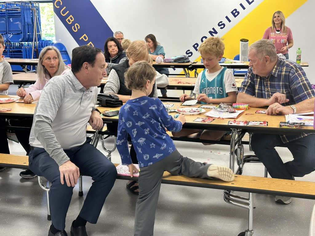 students and grandparents playing bingo