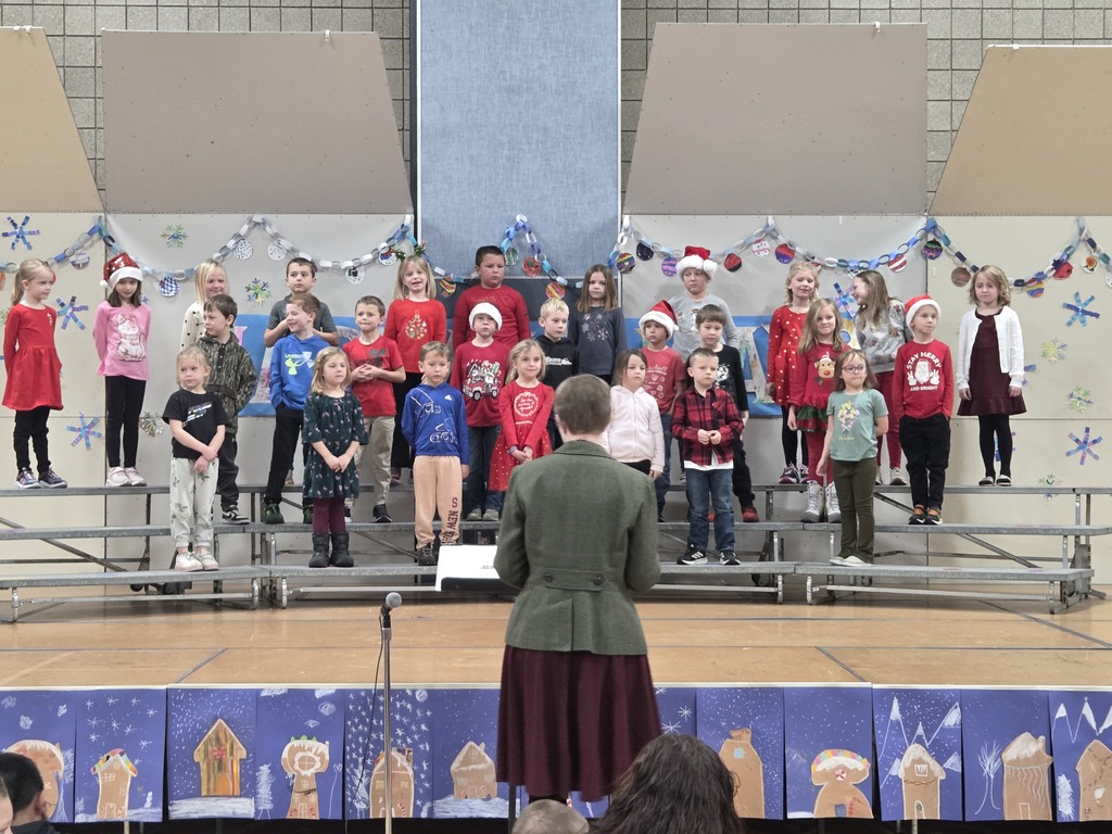 grade 1 group 2 on the risers performing