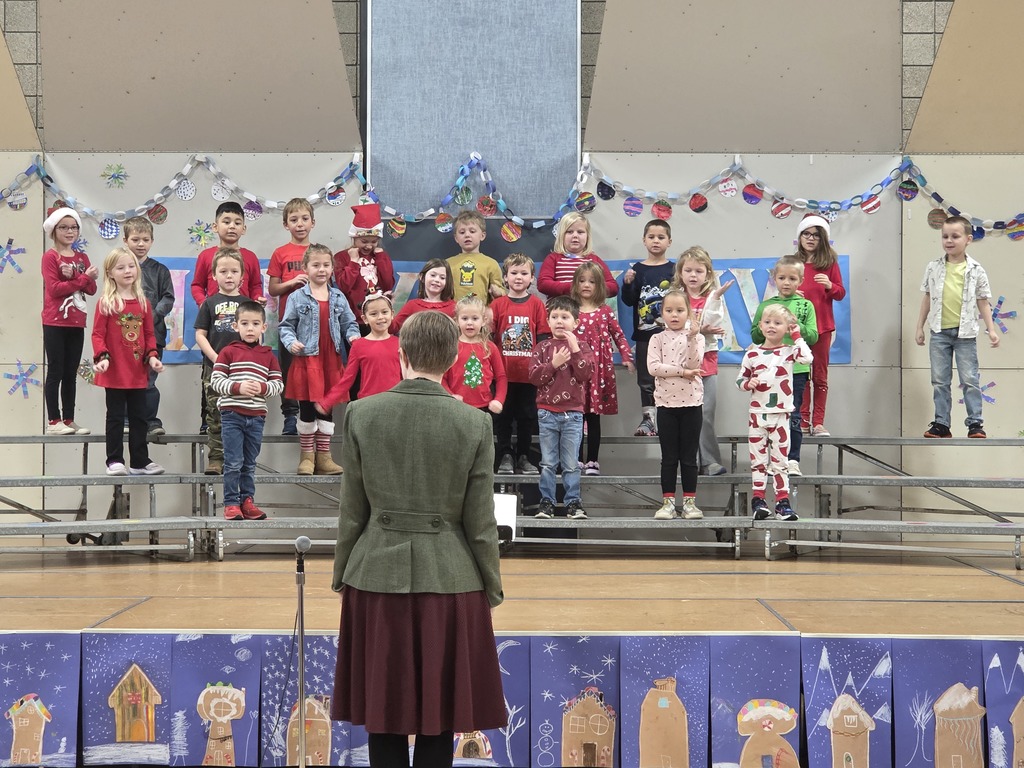 kindergarten group 2 on the risers performing