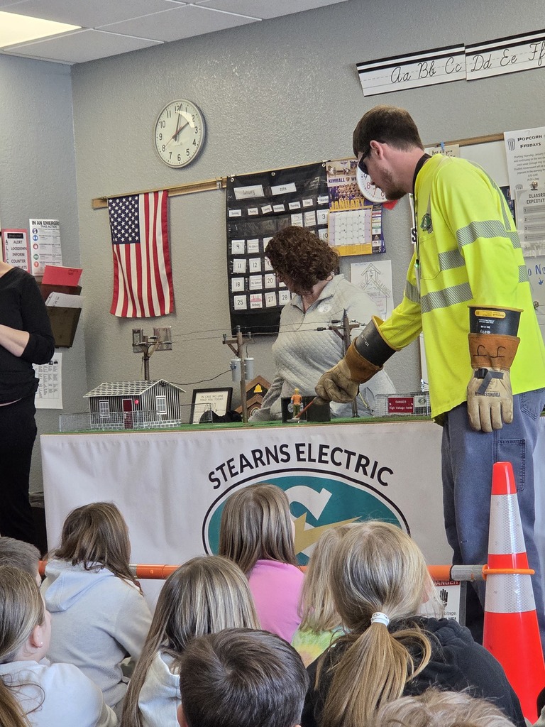 stearns electric personel showing students how electricity works