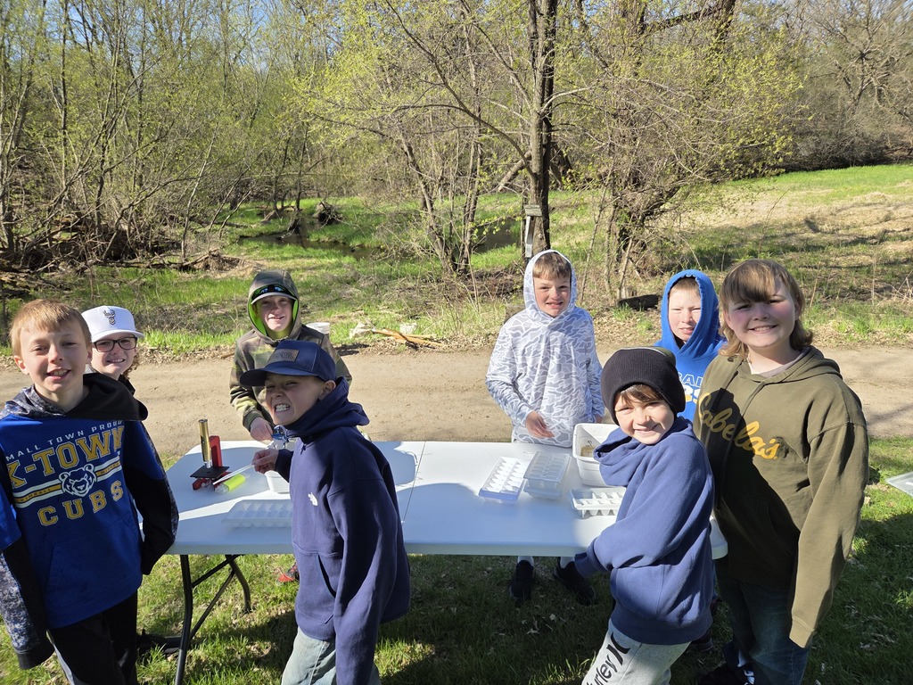 group photo with table and microscope