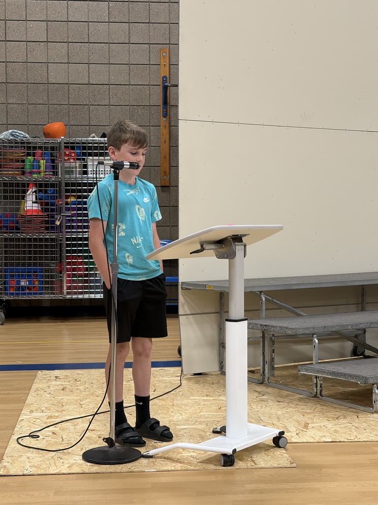 students giving speech at podium