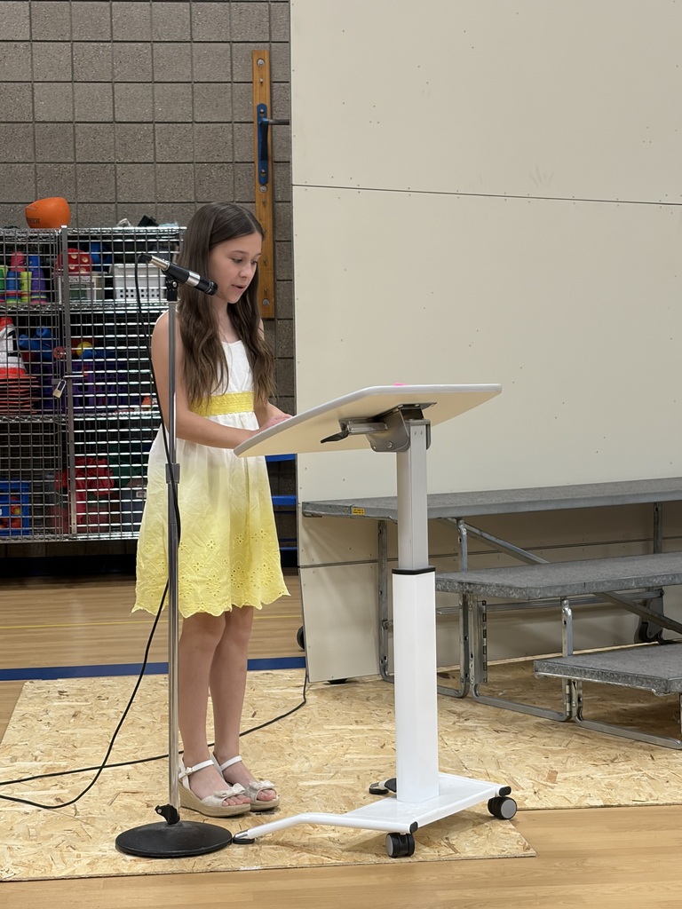 students giving speech at podium