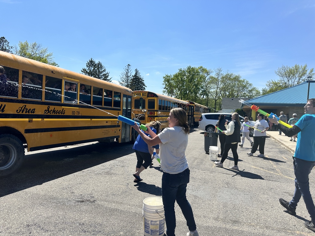 teachers spraying buses with water squirters