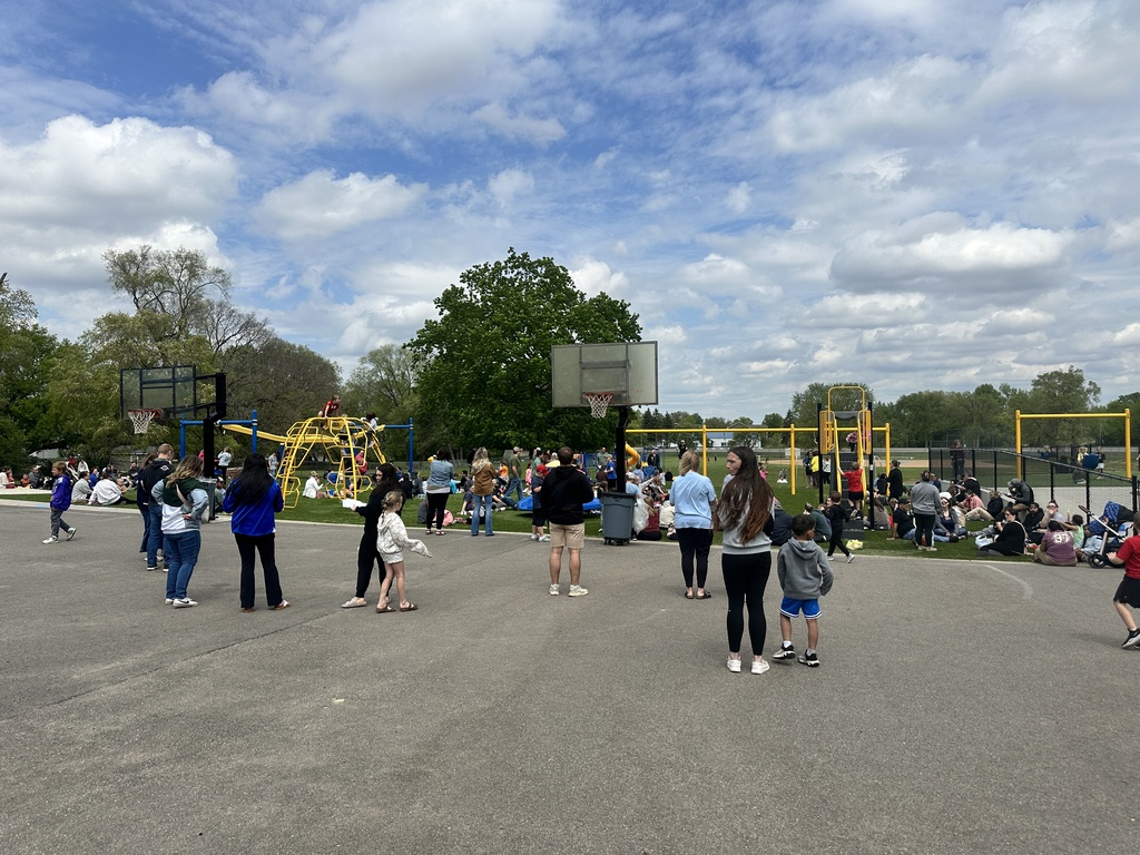 families having lunch on the playground