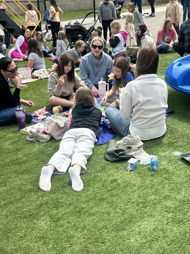 families having lunch on the playground