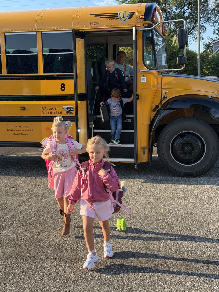 students getting off of bus