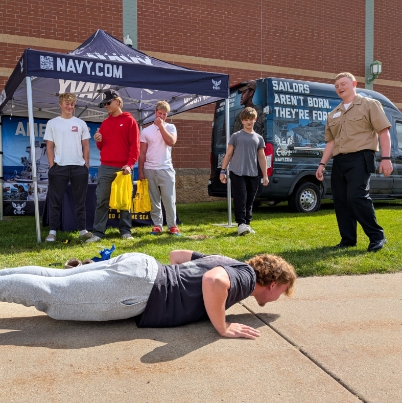 Student at the Big Lake Career Fair exploring the Navy