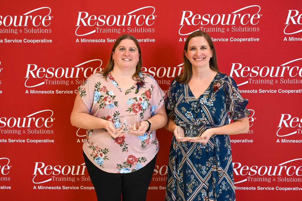 Erin Durga and Melissa Carriveau posing with their LEEA awards