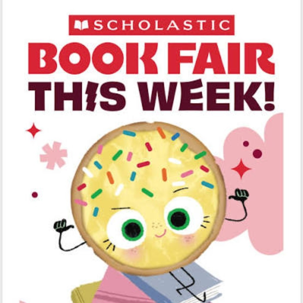 Smart Cookie standing on books.