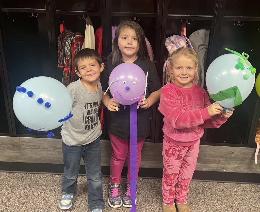 Students with parade balloons