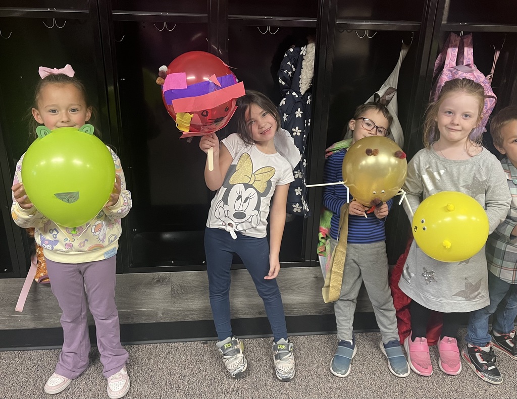 Students with parade balloons