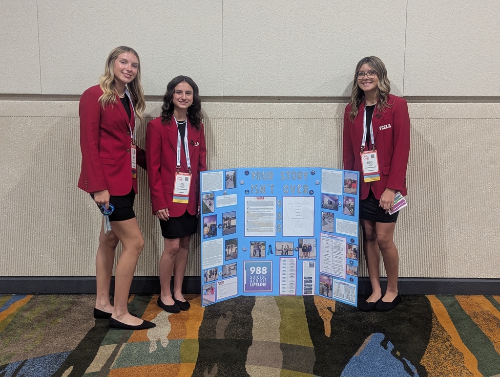 Kinley, Cali, and Bailey with their National Programs in Action project: Your Story Isn't Over