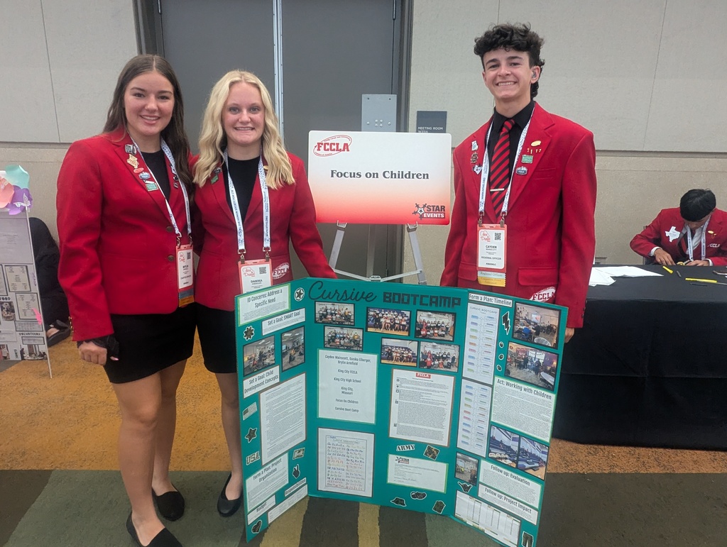 Brylin, Danika, and Cayden with their Focus on Children project: Cursive Bootcamp
