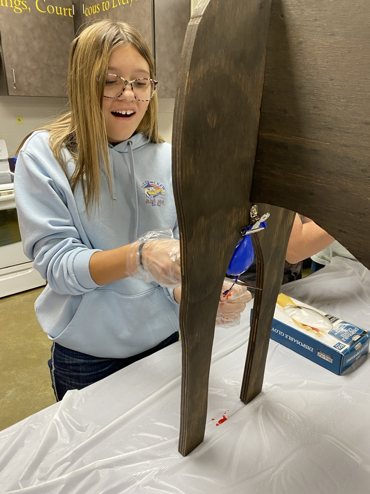 Bailey practicing her skills in castration for our animal reproduction unit.