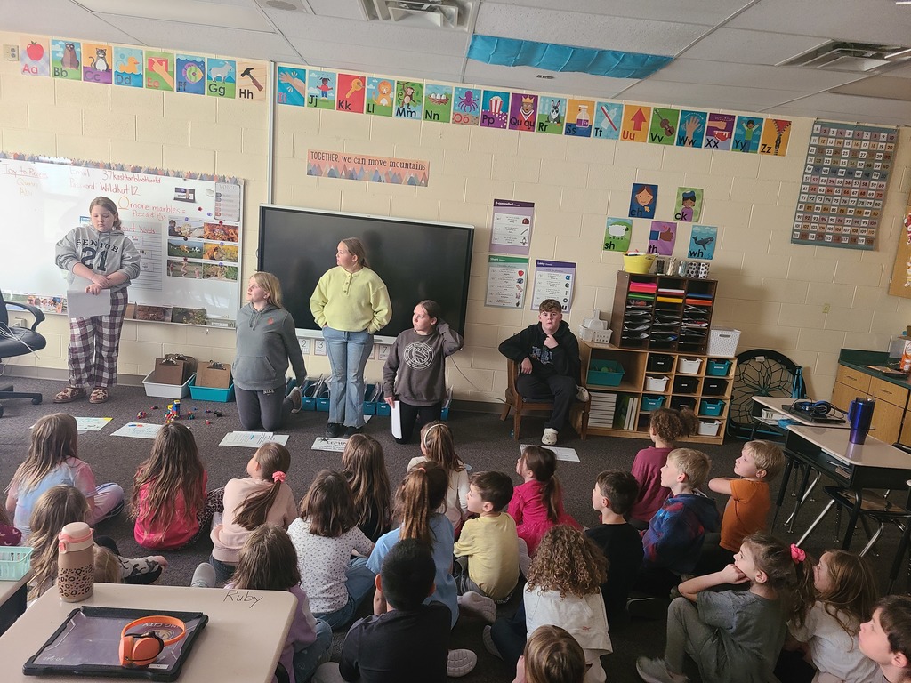 6th graders performing for 1st grade.