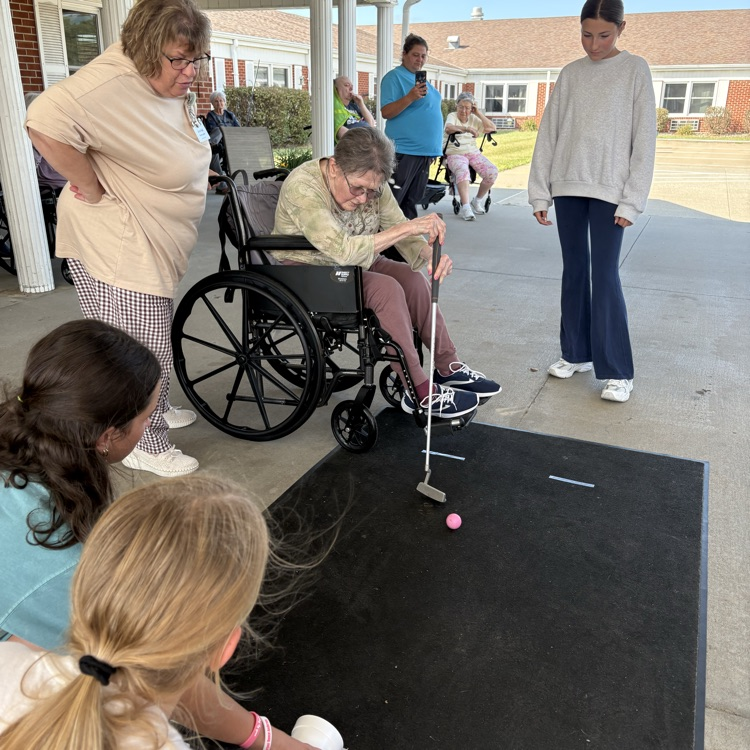 Emersun helped Sharon while Cali and Faith cheer on.