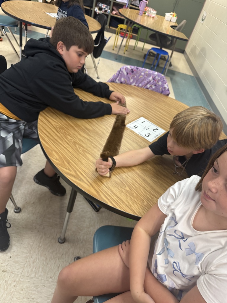 Students learning about Native American culture