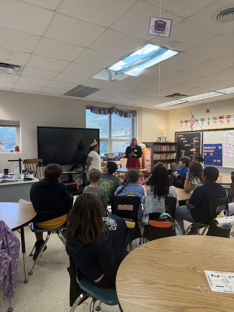 Students learning about Native American culture