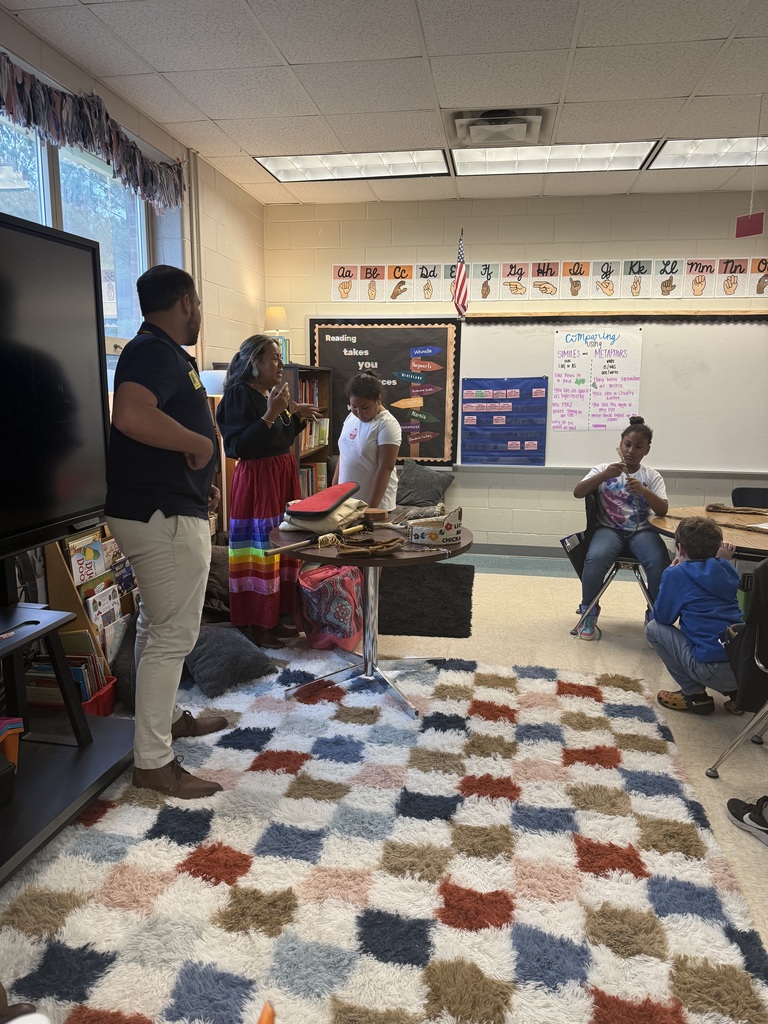 Students learning about Native American culture