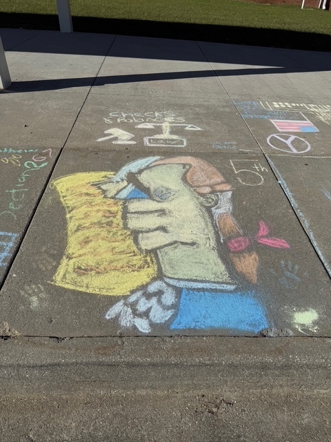 Constitution chalk drawings at the front of the school