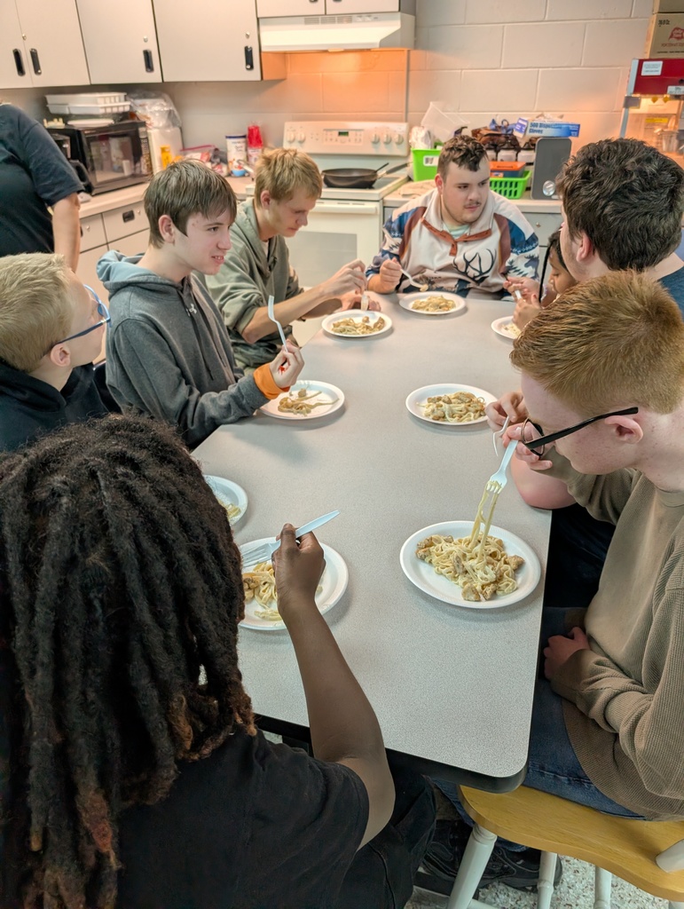 Students enjoying food that they prepared
