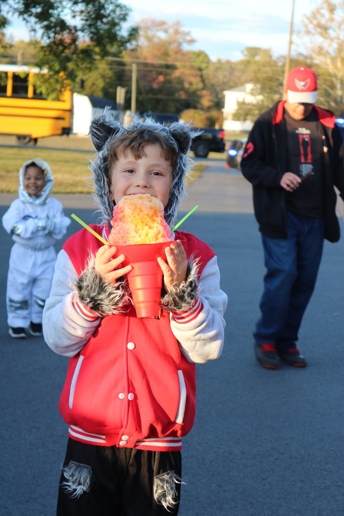 Student eating a snow cone
