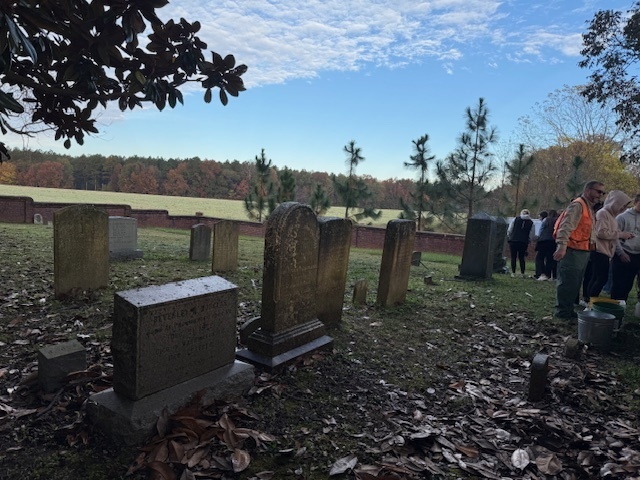 The start of the day with headstones covered in years of debris