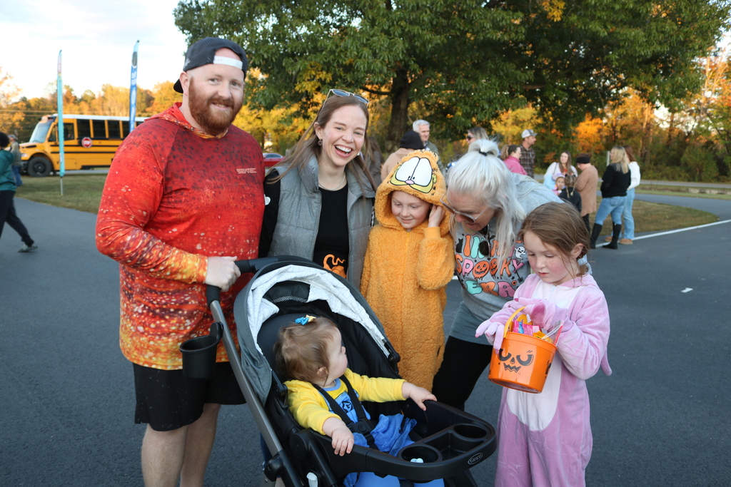 Family dressed up for Trunk or Treat