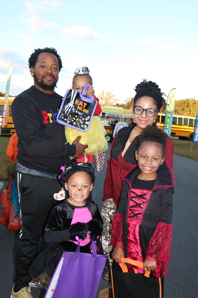 Family dressed up for Trunk or Treat