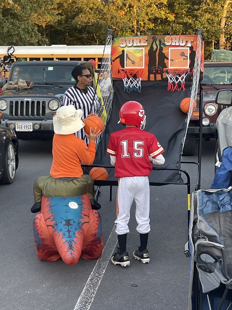 Studentsplaying basketball game at Trunk or Treat