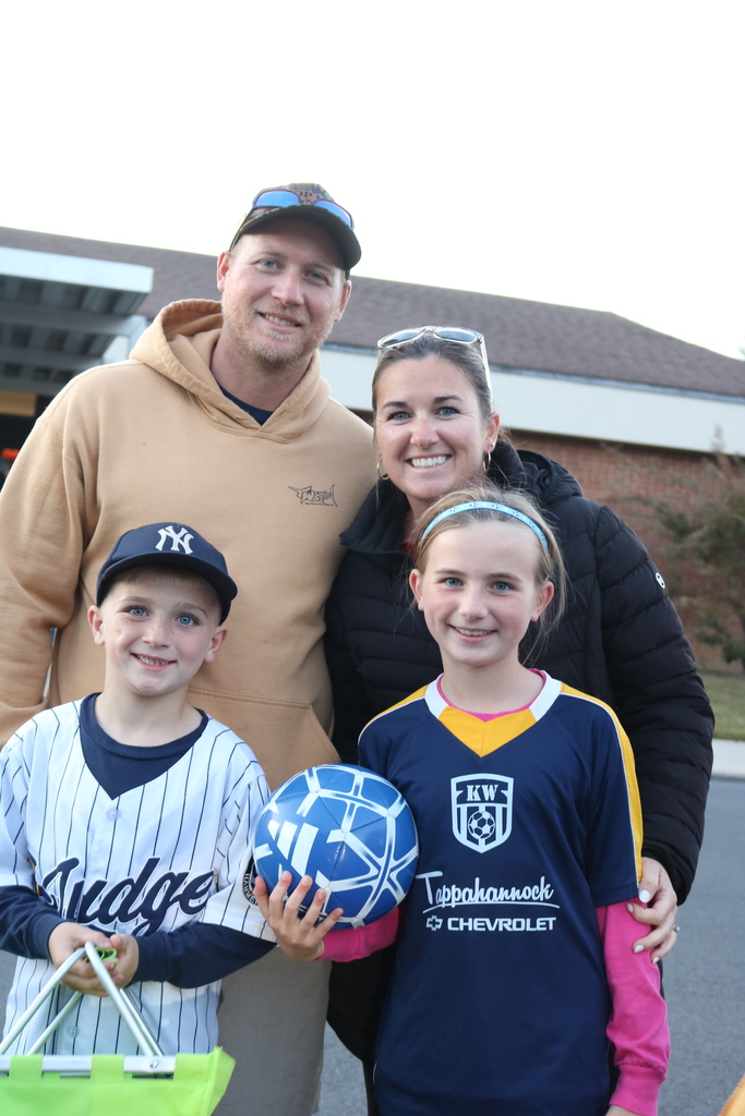 Family dressed up for Trunk or Treat