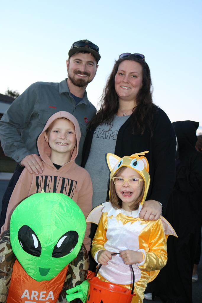 Family dressed up for Trunk or Treat