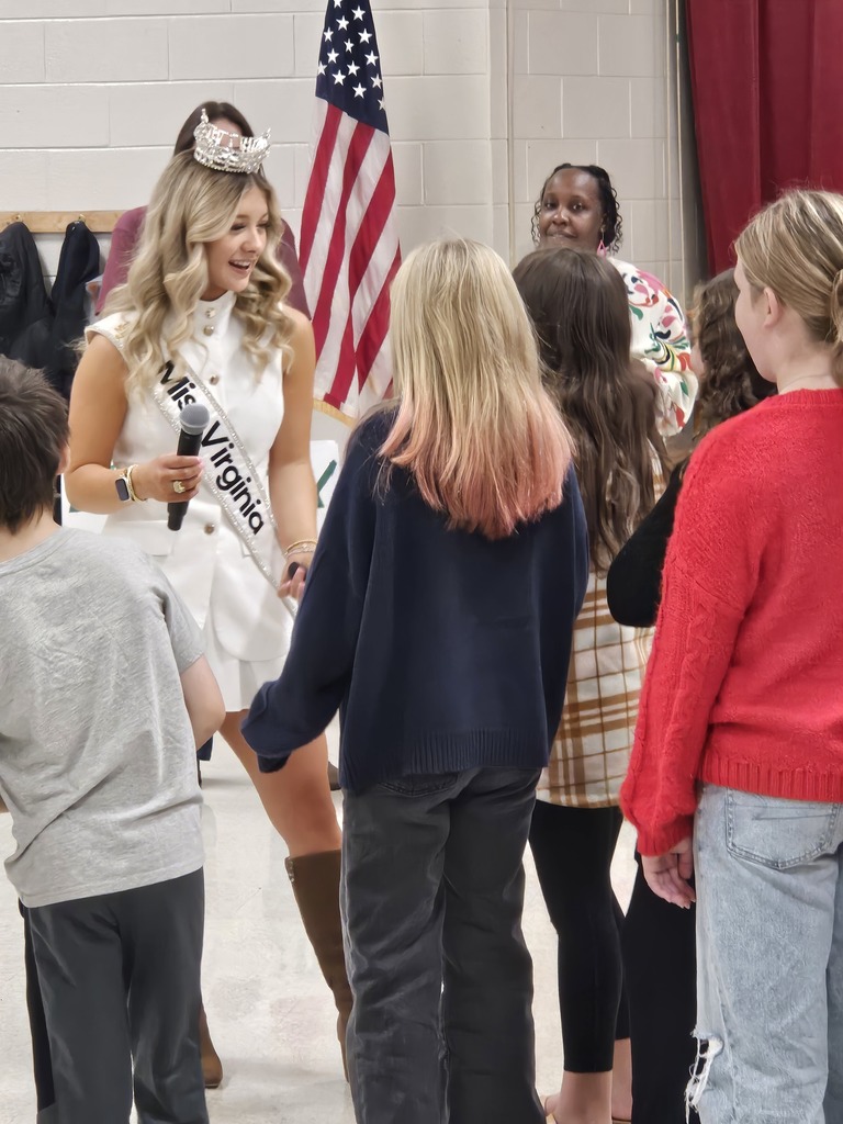 Miss Virginia speaks with a group of students after the assembly