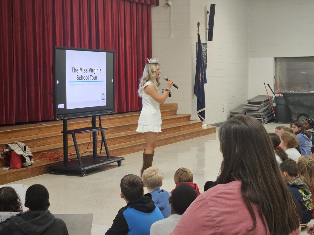 Miss Virginia speaking to the AES students.