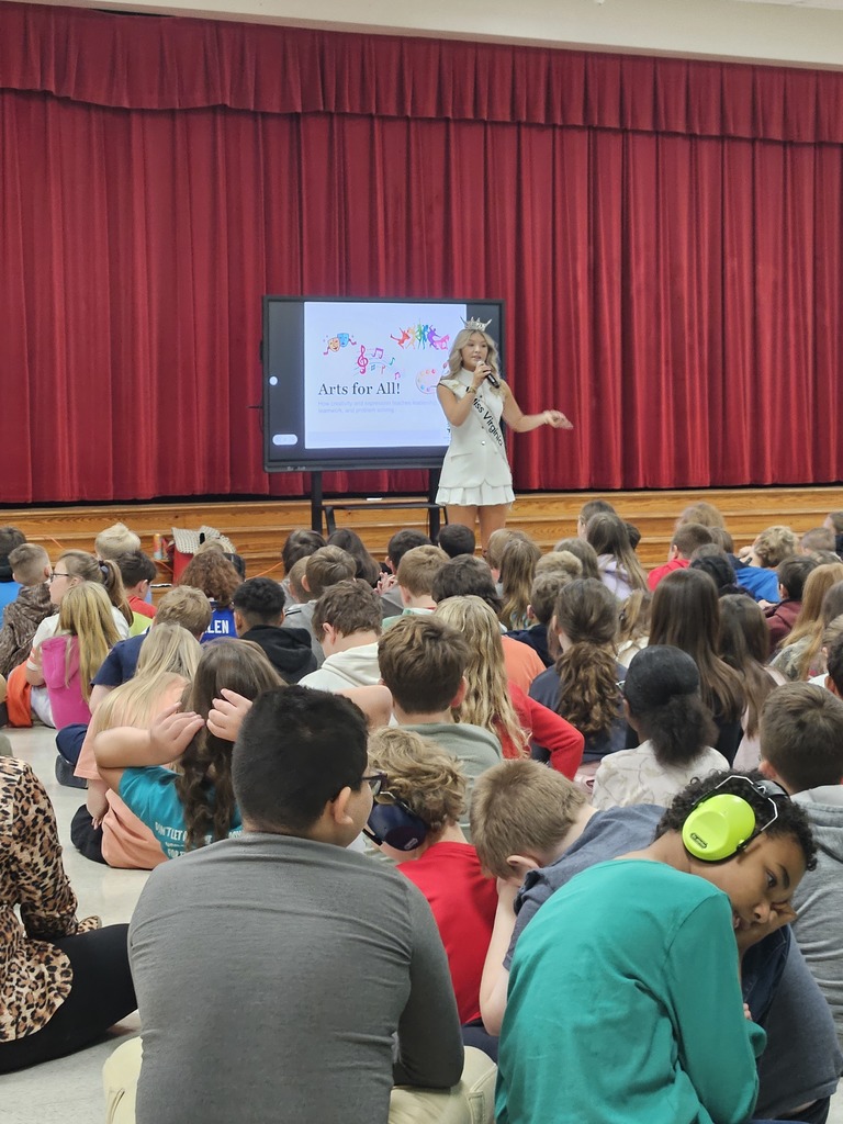 Miss Virginia speaking to the AES students.