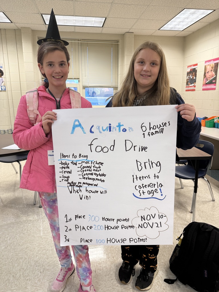 Students promoting AES Food Drive