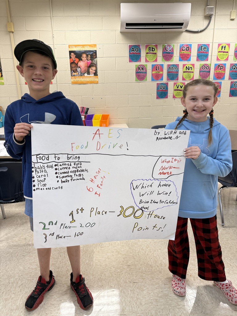 Students promoting AES Food Drive