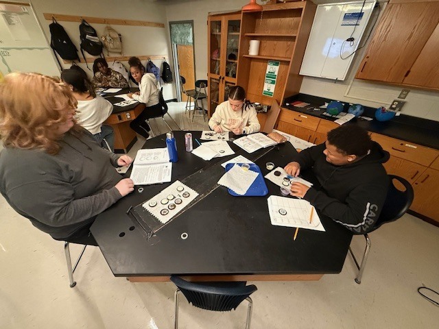 Students working on a mitosis oreo lab