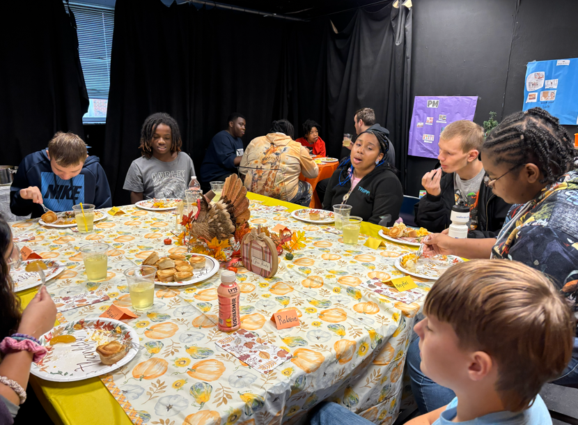 Students enjoying their thanksgiving feast