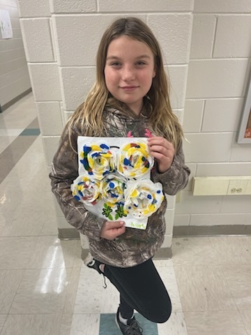 A student showcases their turkey project