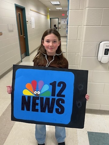 A student showcases their turkey project