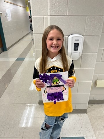 A student showcases their turkey project