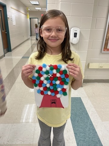 A student showcases their turkey project