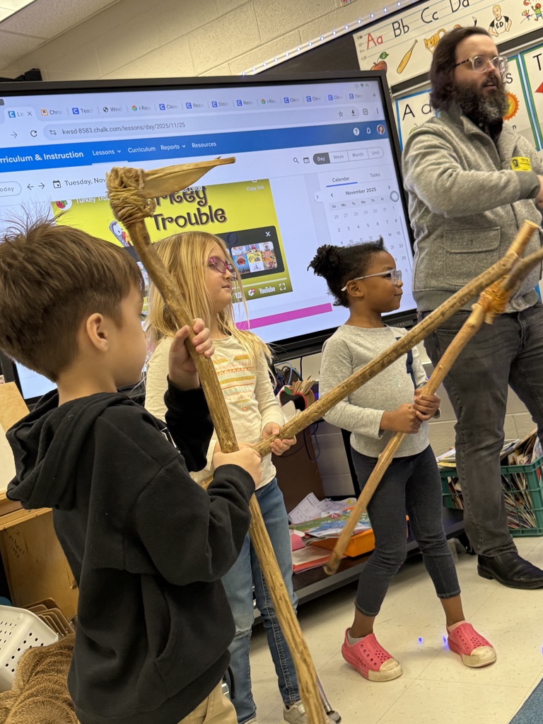 Students with Native American artifacts