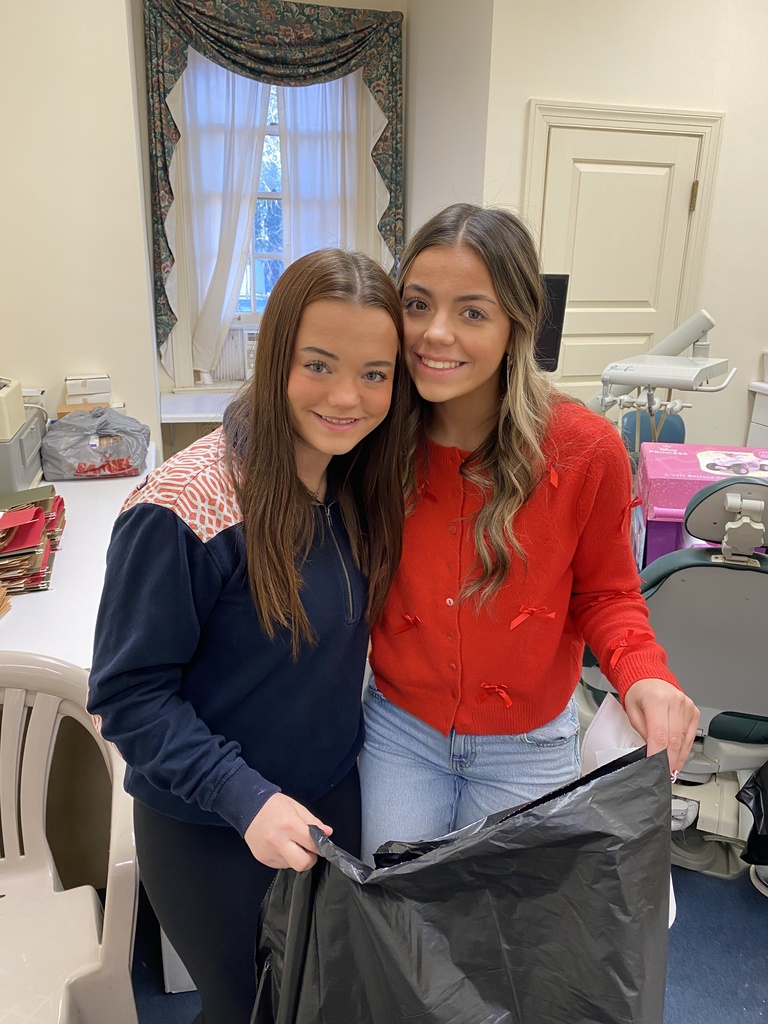 Service Learning Students helping to sort Toys for Tots