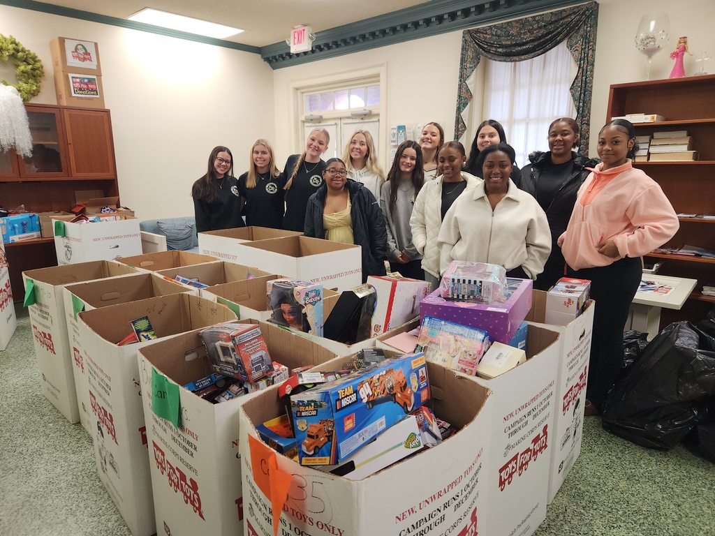 Service Learning Students helping to sort Toys for Tots